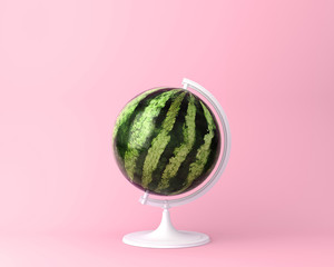 Globe sphere orb watermelon concept on pastel pink background. minimal idea food and fruit concept....