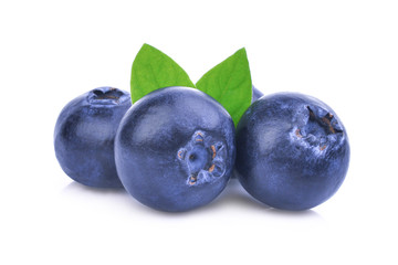 blueberries with green leaves isolated on white background