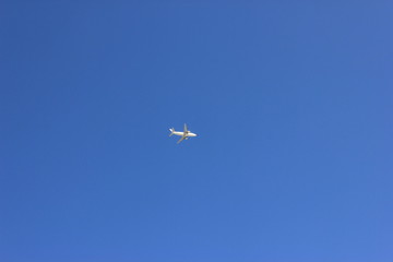 White airplane flying