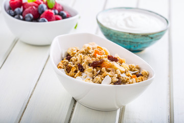 Muesli yoghurt and berries. Healthy breakfast with yogurt granola and fresh fruit