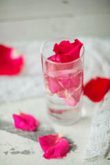 Rose petals in a bowl of water