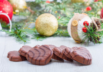 chocolate biscuit with christmas object as background