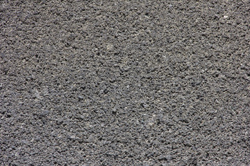 Background porous stone structure of volcanic origin, brown