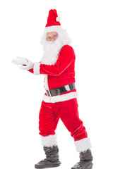 Happy merry Christmas Santa Claus pointing holding Gift Box with Isolated on white background.