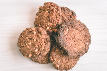 Oat chocolate cookies homemade on white table