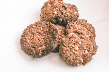 Oat chocolate cookies homemade on white table