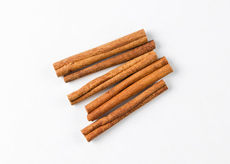 Cinnamon sticks on white background. Canella isolated. Cassia bark.