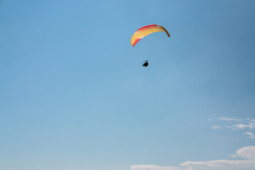 Fototapeta na wymiar man flying on paraglider