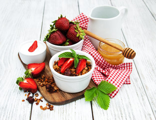 Homemade granola with strawberries