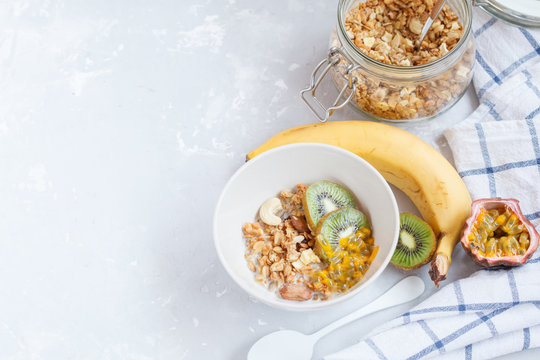 Healthy breakfast: muesli, yoghurt, fruit