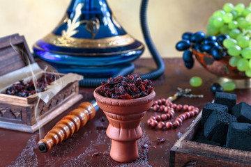 Shisha in the clay bowl made for Smoking hookah