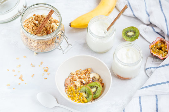 Healthy breakfast: muesli, yoghurt, fruit