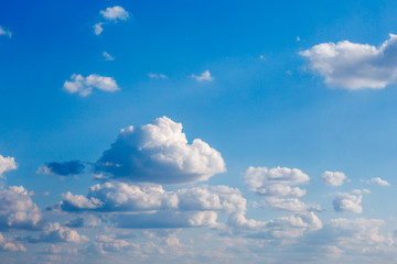 Beautiful blue sky with clouds background. Weather, nature, blue air