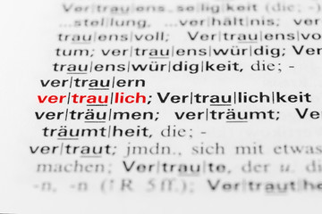 Obraz premium Das Wort vertraulich in einem Buch
