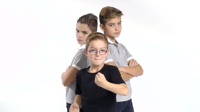 Cool gang of three brothers at white background