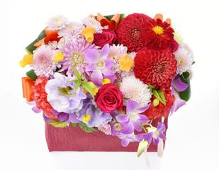Flower arrangement in a red box on a white background