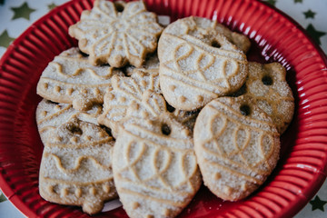 .Delicious dish of homemade cookies decorated for Christmas time. Lifestyle photography.