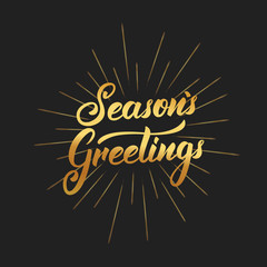 Seasons Greetings text lettering design. Christmas and New Year greeting typography of gold gradient and gold burst