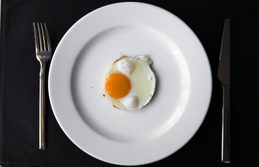 Scrambled eggs on white plate