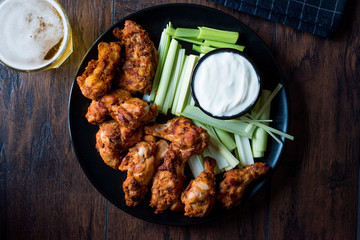 Buffalo Wings with Dip Sauce and Beer