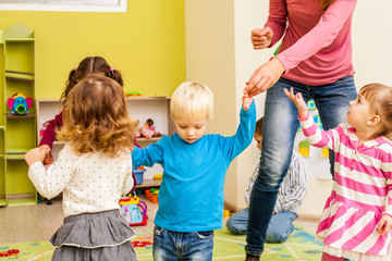 Group of little children dancing 