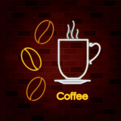 hot coffee cup on dish and coffee beans in neon sign on brick wall