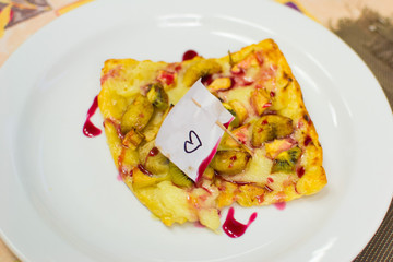 children prepare fruit pizza
