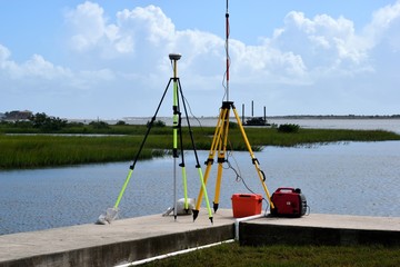 Surveying equipment by the river's edge Florida, USA