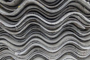 the removal of asbestos. old sheets of asbestos.