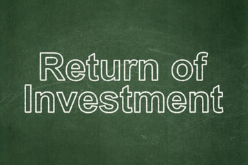 Finance concept: text Return of Investment on Green chalkboard background
