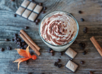 cottage cheese dessert tiramisu in Cup on a wooden Board