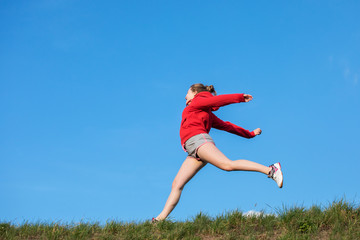 athletic girl jumping
