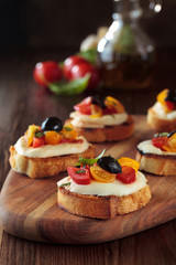 Bruschetta with tomatoes and mozzarella.