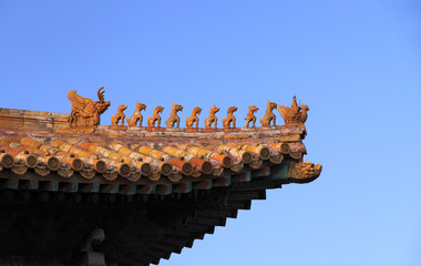 Fototapeta na wymiar Imperial roof decoration of the highest status on the roof ridge of the Hall of Supreme Harmony, Forbidden City, Beijing, China