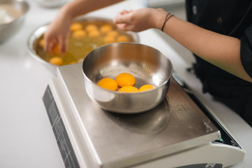 Bakery chef cooking bake in the kitchen professional