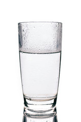 Glass with cold water isolated on white background