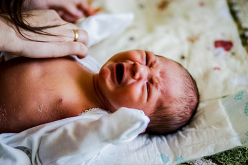 A little baby cries and screams