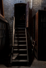 Staircase and entrace of an abandoned and old attic