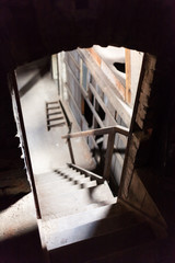 Staircase of an abandoned and old attic