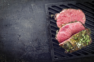 Barbecue wagyu chateaubriand with herb as close-up on a grillage