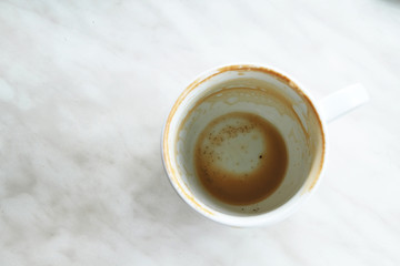 Empty dirty coffee cup