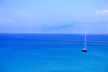 Fototapeta na wymiar Sailing. Ship yachts with white sails in the open Sea.