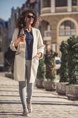 Fototapeta premium Young woman in city