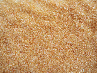 Brown sugar on white background 