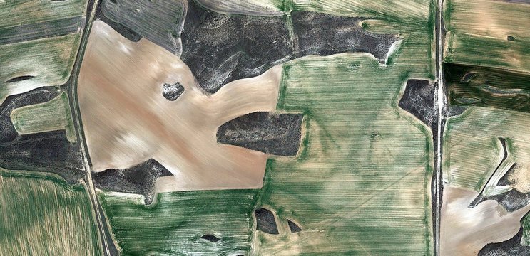 dry and wet, allegory, tribute to Picasso abstract photography of the Spain fields from the air, aerial view, representation of human labor camps, abstract, cubism, abstract naturalism,
