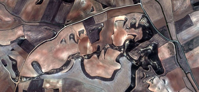 limits, allegory, tribute to Picasso, abstract photography of the Spain fields from the air, aerial view, representation of human labor camps, abstract, cubism, abstract naturalism,