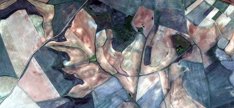 the horse's jump, allegory, tribute to Picasso, abstract photography of the Spain fields from the air, aerial view, representation of human labor camps, abstract, cubism, abstract naturalism,
