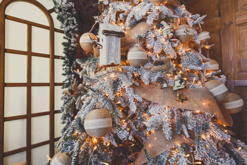 Beatiful christmas decorated tree in shining lights