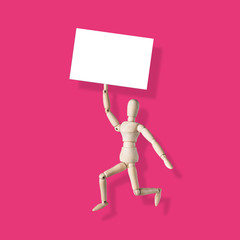 Wooden Mannequin run or jump with white board on pink background
