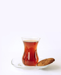 glass of Turkish tea isolated on white with cokiee